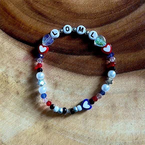 5 for $20 Taylor Swift Handmade Friendship Beaded Bracelet
“LOML” - Picture 1 of 1